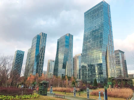 Incheon city, South Korea - Autumn 2021: Big buildings in City Park of Incheon city.のeditorial素材