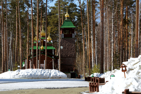 Wooden Russian Orthodox Christian Church of St. Sergius of Radonezh in Ganina Yama Monastery on early Spring, Yekaterinburg, Russia.の写真素材