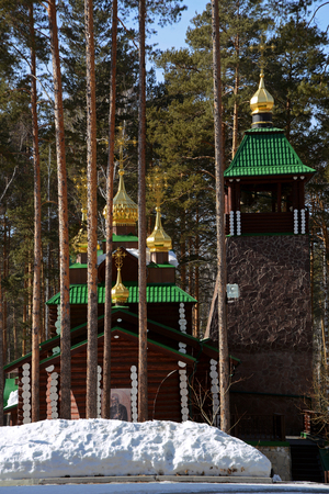 Wooden Russian Orthodox Christian Church of St. Sergius of Radonezh in Ganina Yama Monastery on early Spring, Yekaterinburg, Russia.の写真素材