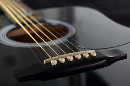 Chevalet de guitare acoustiqueの写真素材