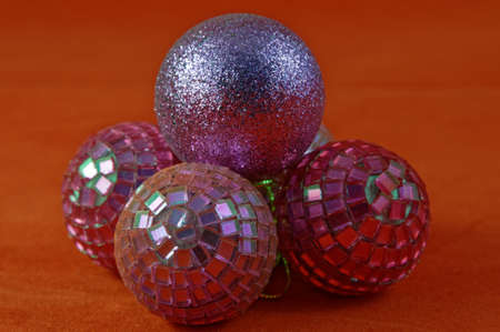 Bright and colourful reflecting baublesの写真素材