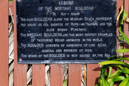 A plaque telling of the legend of the Moeraki Boulders, calcite concretions which are millions of years old, found in New Zealand's South Islandのeditorial素材