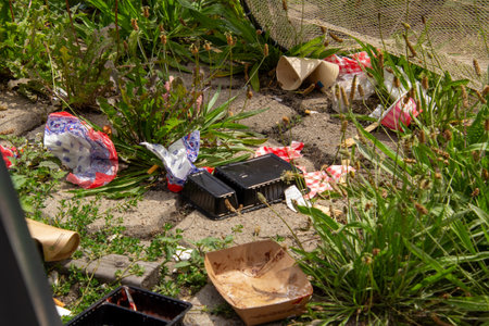 Catching garbage in a garbage bin or in a fishing net.の写真素材