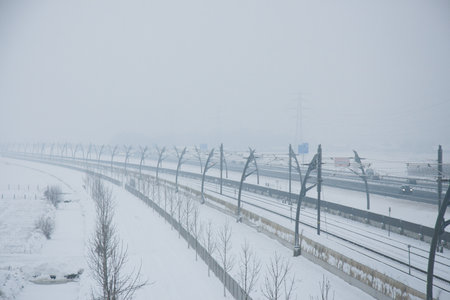 Traffic on the railroads in Tiel has to deal with bad weather.の写真素材
