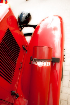 Holder for fire blanket on vintage fire brigade truck
