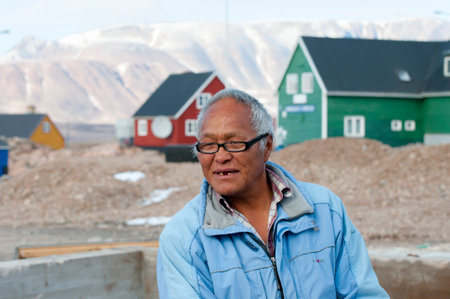 ITTOQQORTOORMIIT, GREENLAND - SEPTEMBER 9, 2012: Old man living in this small town on the eastern...