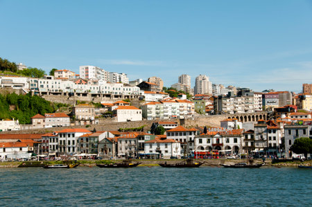 PORTO, PORTUGAL - June 6, 2016: Buildings on Diogo Leite Avenue near the Douro river where  visitors can take visits in the famed Port cellarsのeditorial素材