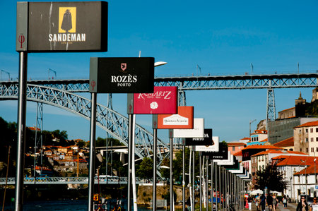PORTO, PORTUGAL - June 6, 2016: Port wine cellars brands in proximity to Douro riverのeditorial素材