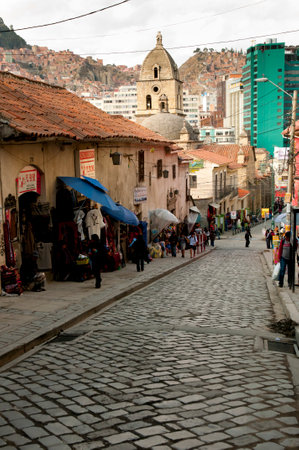 LA PAZ, BOLIVIA - September 5, 2014: Sagarnaga cobble street with tourist shops & local restaurantsのeditorial素材