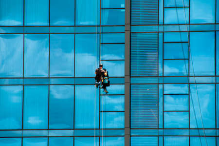 Windows Cleaning on City Buildingの写真素材