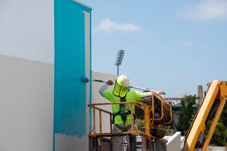 Industrial Painting on Apartment Buildingの写真素材