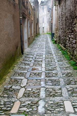 Pedestrian Cobblestone Street in Erice - Sicily - Italyの写真素材