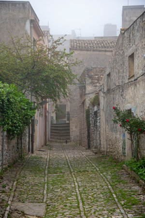 Pedestrian Cobblestone Street in Erice - Sicily - Italyの写真素材