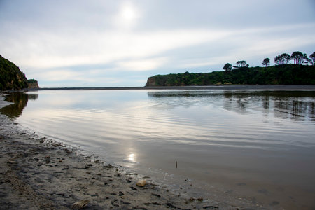 Coastal landscape at low tide with a view of the sea.の写真素材