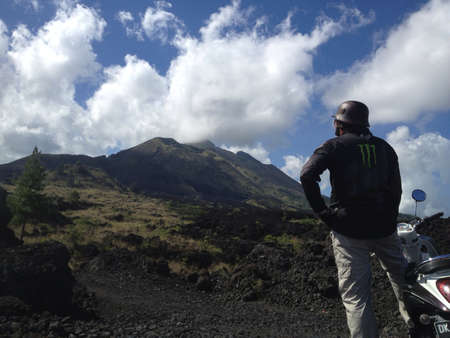A scenic view of the Batur Volcanic Mountain in Bali Indonesia. Local has been harvesting the remaining lava and process to make charcoalの素材