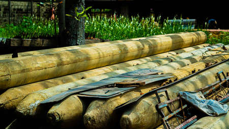 Abandoned bamboo rafts in the garden. Selective focus.の写真素材