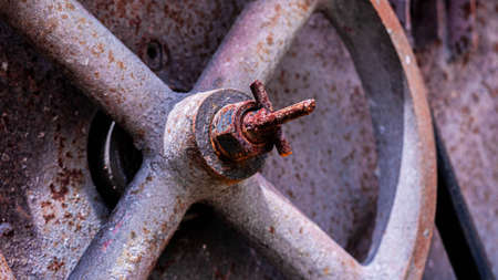 rusty wheel of an old locomotive, close-up.の写真素材