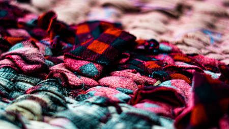 Texture, background, pattern, red wool scarf with a checkered pattern.の写真素材