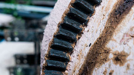Close-up of a gear wheel on a construction site. Construction industry.の写真素材