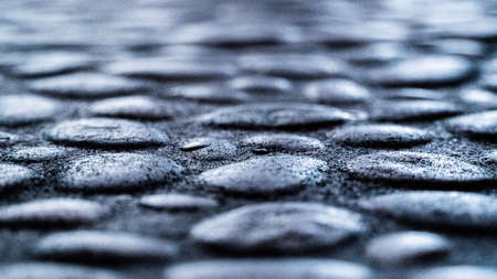 Water drops on a metal surface. Abstract background with water drops.の写真素材