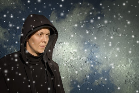 Portrait of serious person in the snow. Weather concept.の写真素材