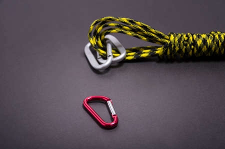 Mountaineers' carabiner with climbers ropeの写真素材