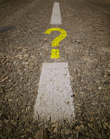 Question mark drawn on a asphalt road.の写真素材