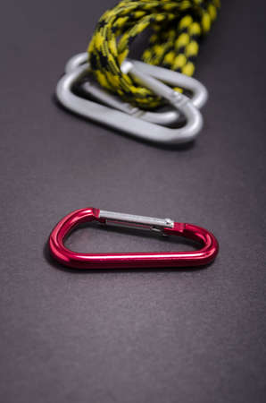 Mountaineers' carabiner with climbers ropeの写真素材