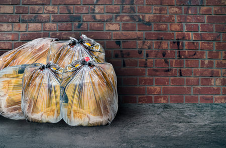 Pile of full garbage bagsの写真素材