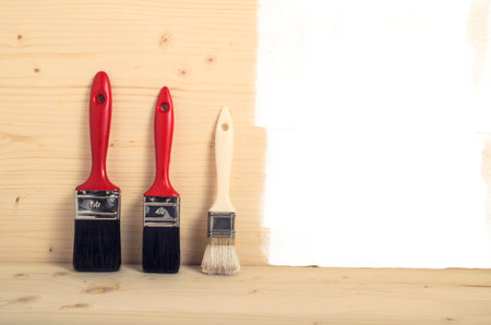 Paint Brush ready for painting. Decorating concept.