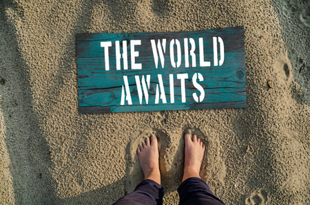 The world awaits. Motivational poster. Travel concept.の写真素材