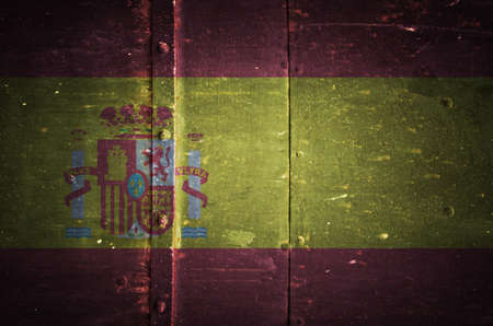 Spain flag on grunge metal texture backgroundの写真素材