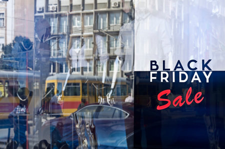 Retail Image Of A Black Friday Sale Sign In A Clothing Store Window (With Shallow DoF)の写真素材
