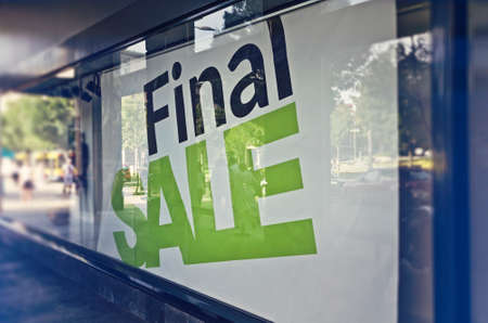 Retail Image Of A Final Sale Sign In A Clothing Store Window (With Shallow DoF)の写真素材