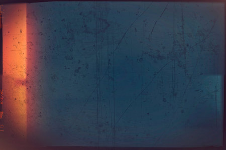 Blank grained and scratched film strip texture background