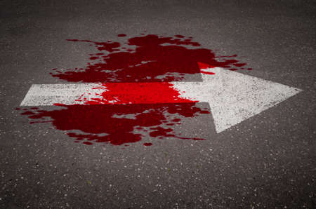 Conceptual image of a blood on the street pavement. Concept of violence.の写真素材