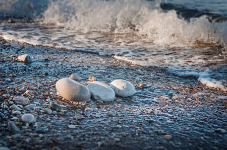 Beach. Stones on beach and sea water.の写真素材