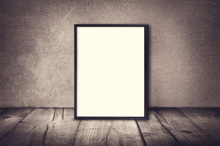 Empty poster with floor and wallの写真素材