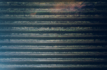 Dark rusty painted metal texture for backgroundの写真素材