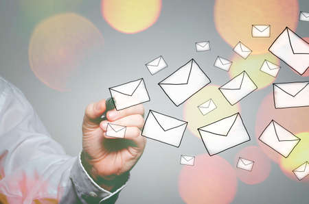 Businessman drawing E-mails conceptの写真素材