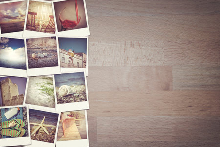 Travel photo collage on wooden background