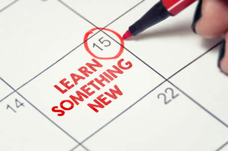 Learn something new. New skills, education, self improvement concept date marked on the calendar. Making and following a study schedule.の写真素材