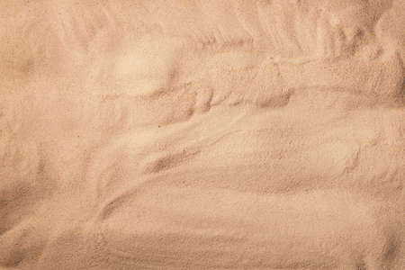 Sand texture. Sandy beach for background. Top view.の写真素材