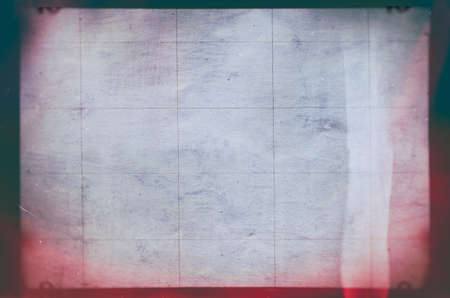 Blank grained and scratched film strip texture backgroundの写真素材