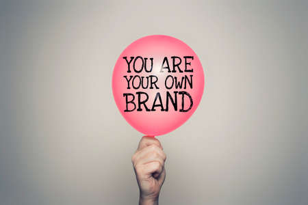 You are your own brand balloon in handの写真素材