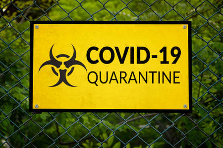 Covid-19 quarantine fence warning signの写真素材