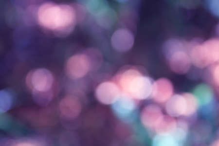 Abstract violet bokeh light backgroundの写真素材