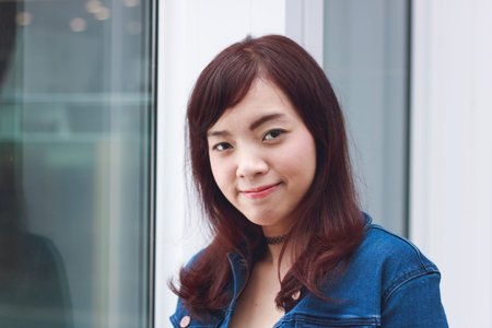 Beautiful Asian woman smiling with outdoor scene in matte style