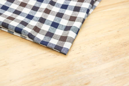 Kitchen napkin on wooden backgroundの写真素材
