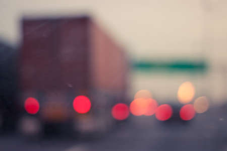 Defocused or blur traffic road with bokeh lightの写真素材